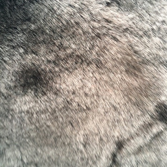 A brown furry bag with tags from indigo - Picture 4 of 4